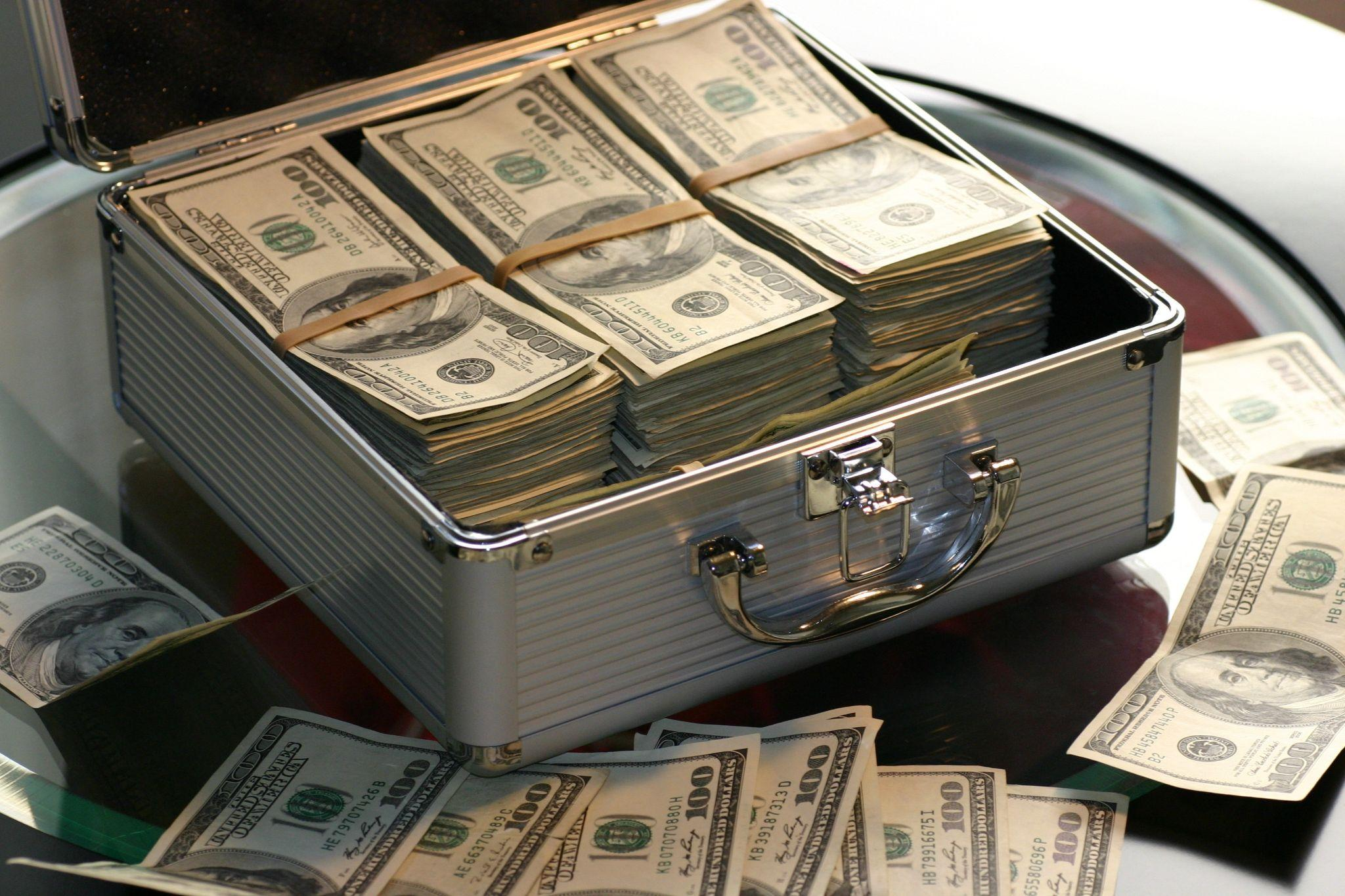 Suitcase full of money during money lending transaction